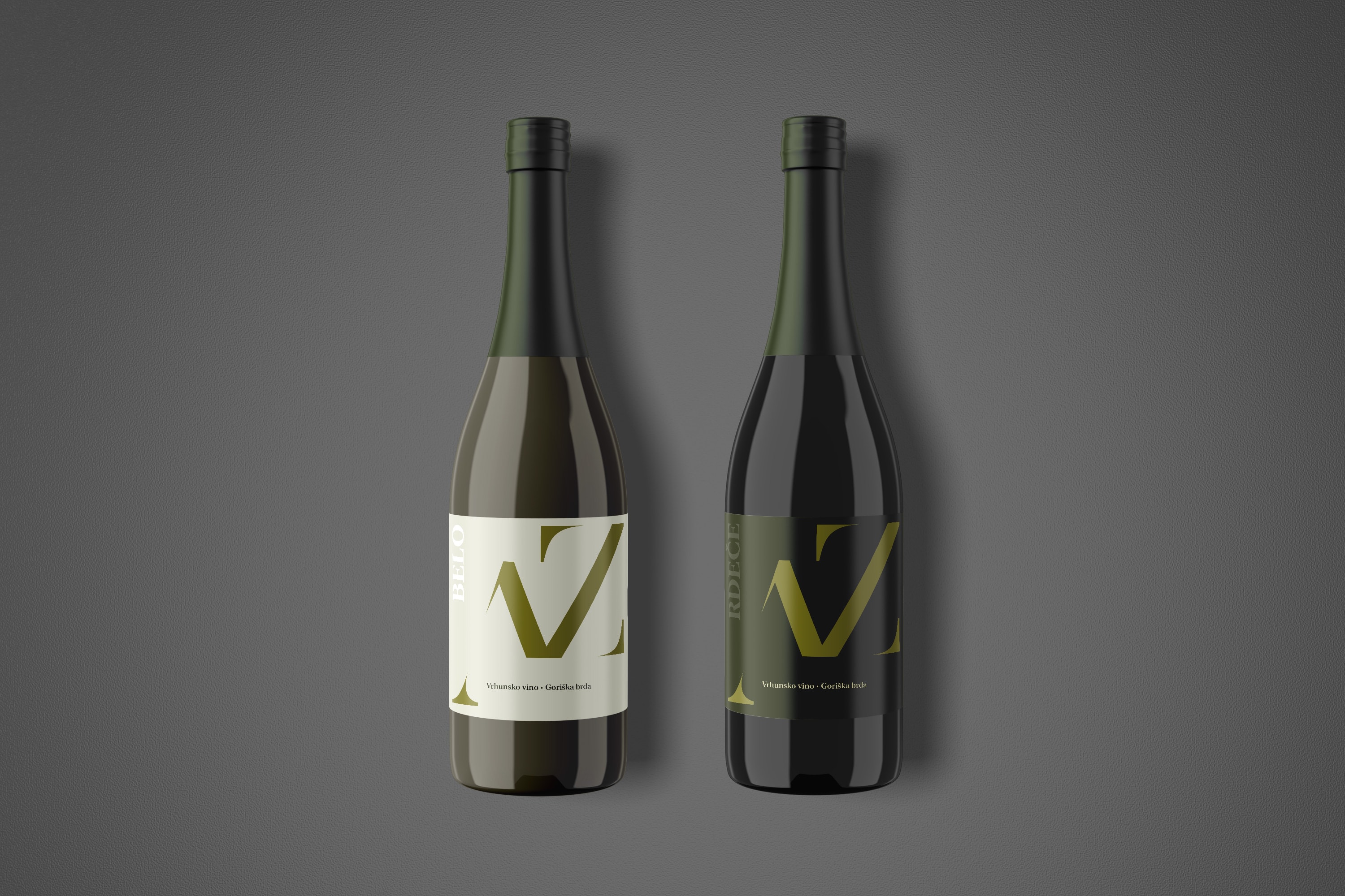 Two wine bottles with light and dark AZ labels