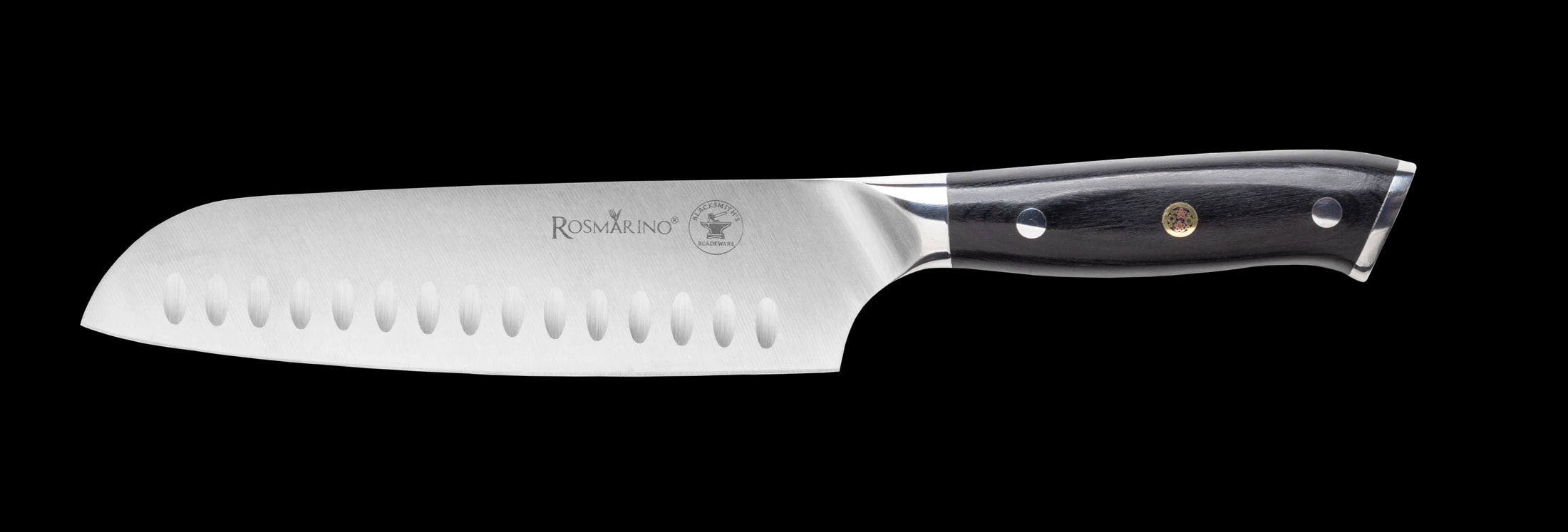 Close-up of the Kyoto knife’s blade engraving, bolster and riveted handle