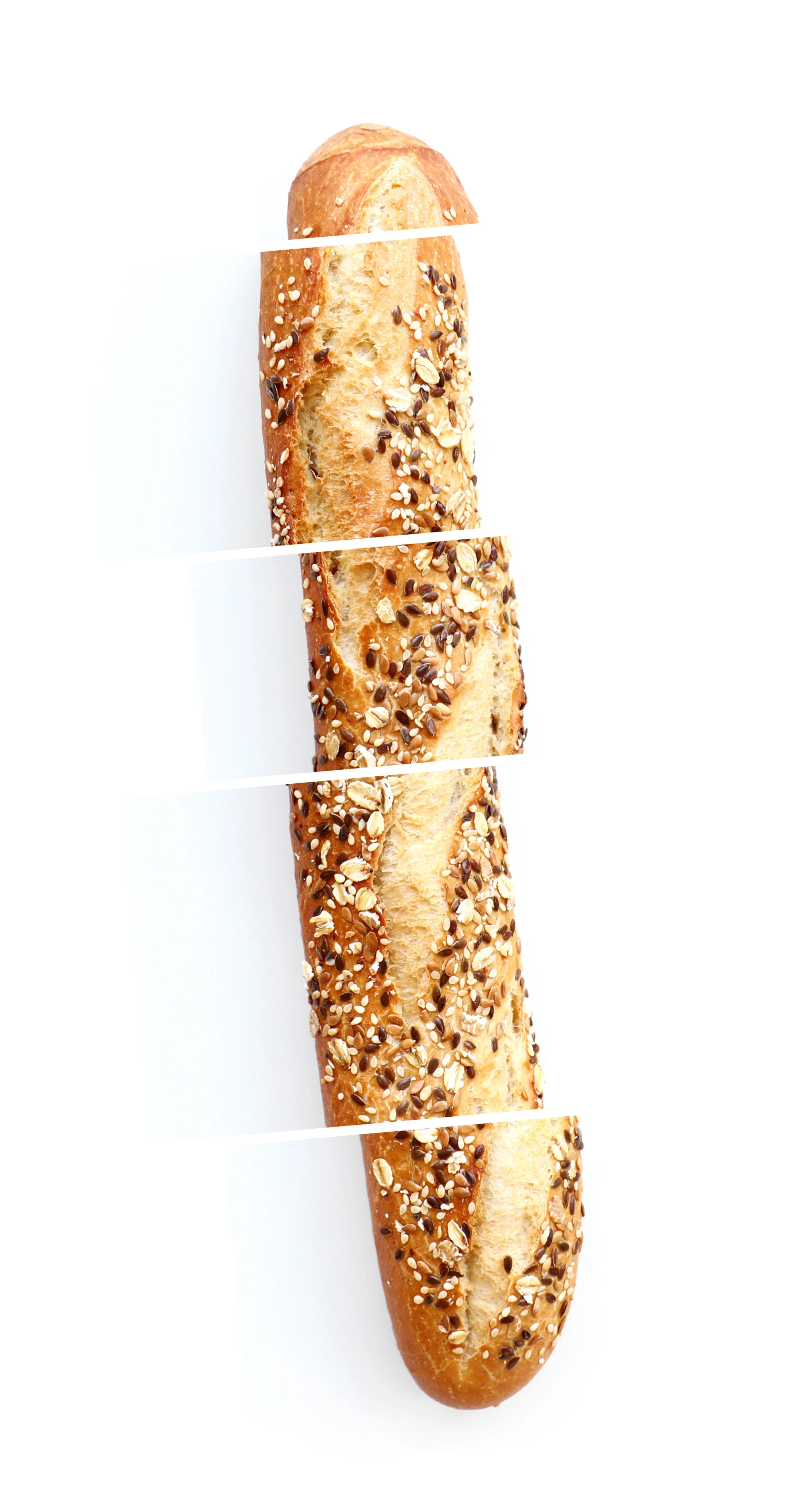 A baguette separated into slices, used in the Kyoto bread knife packaging